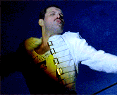 GIF com Freddie Mercury durante um show.
